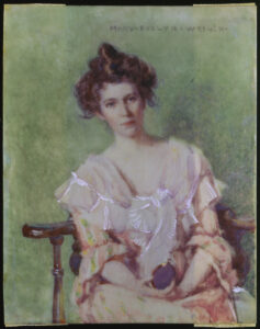 Portait of a person wearing an Edwardian era gown. 