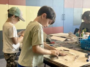 Children playing with modelling clay. 